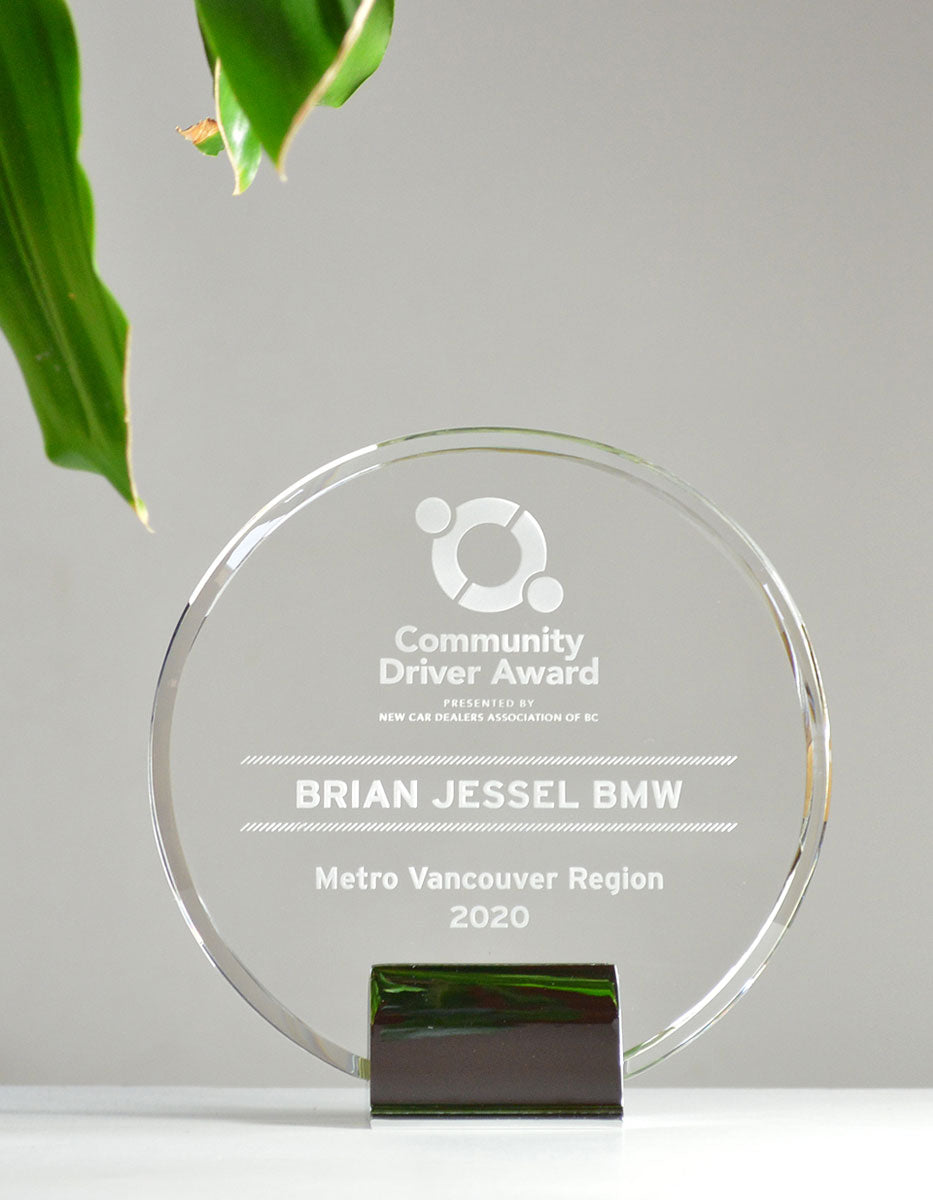 Precision sandblast engraving listing deal details on a clear crystal tombstone